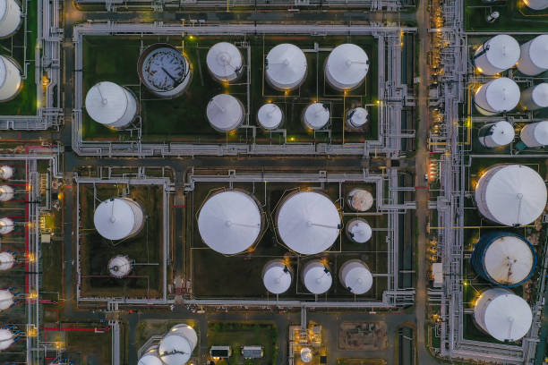 Aerial view oil terminal is industrial facility for storage of oil and petrochemical products ready for transport to further storage facilities.